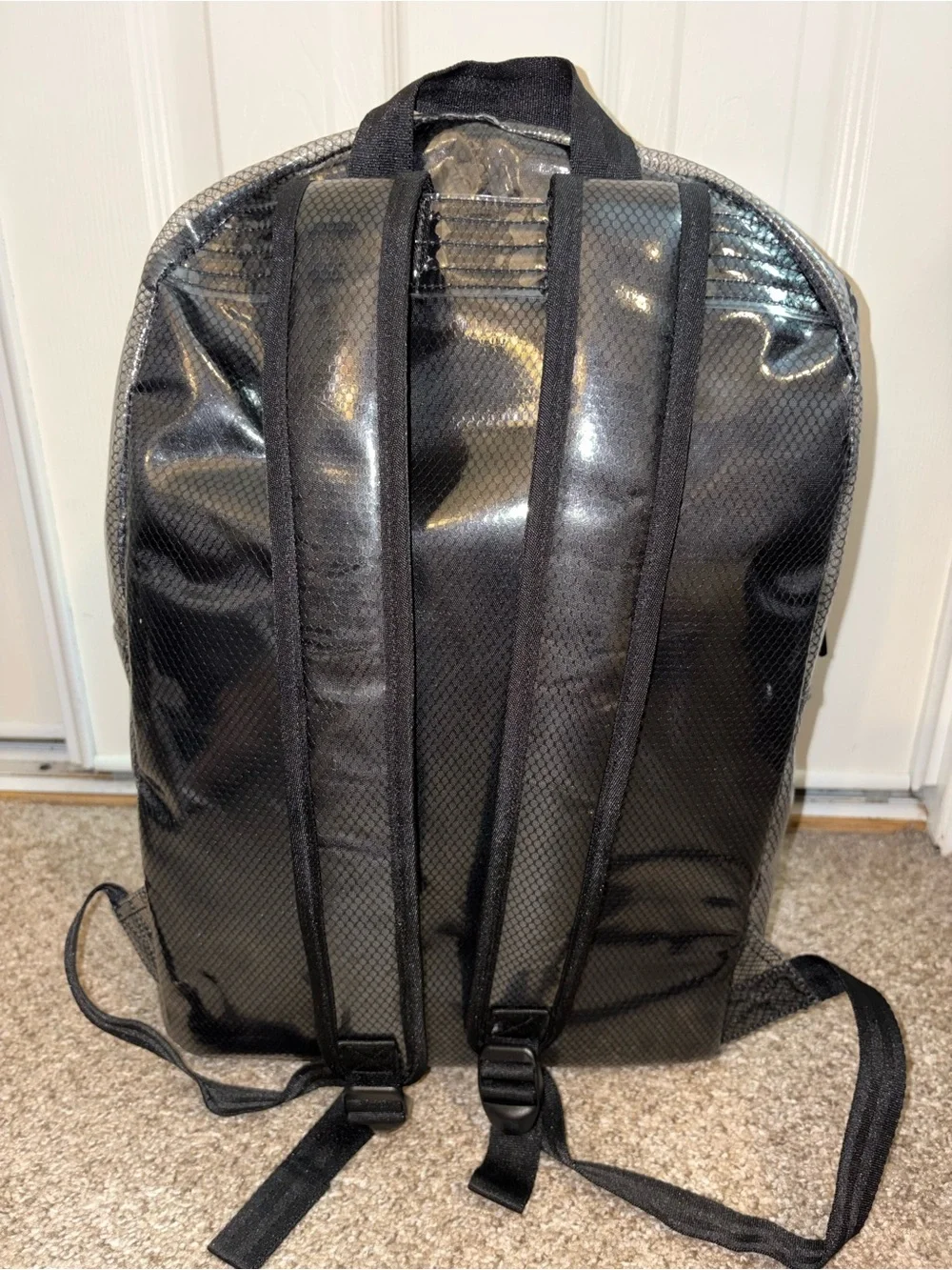 Champion Black Vinyl Backpack with Red & White Logo Patch